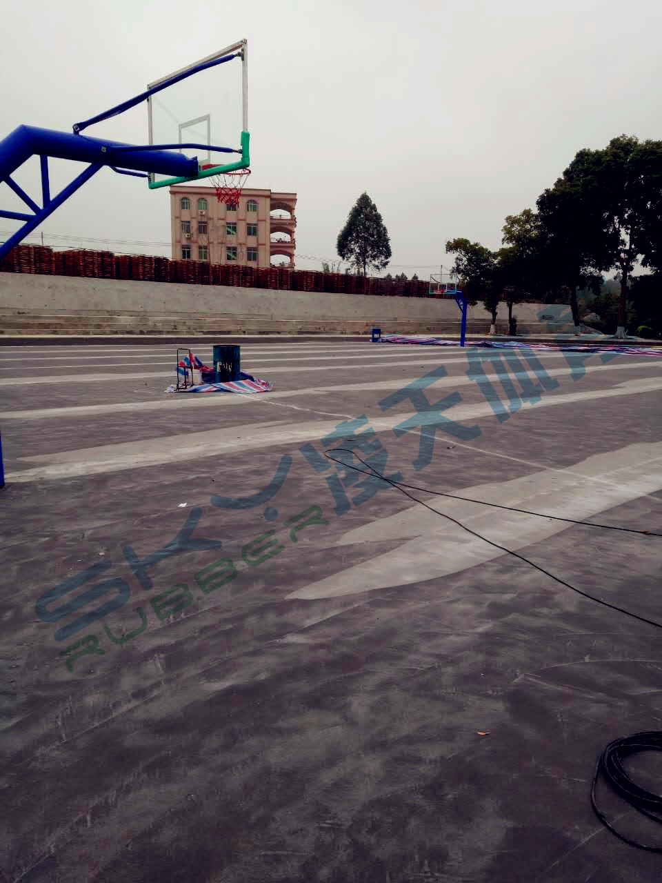 丙烯酸蓝球场案例：江门市鹤山宅梧小学弹性丙